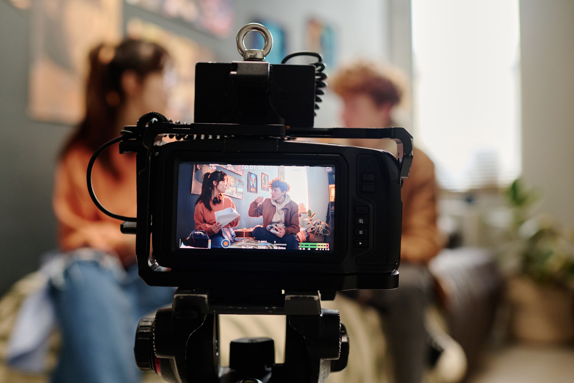 Filming Scene with Professional Camera in Studio Setting