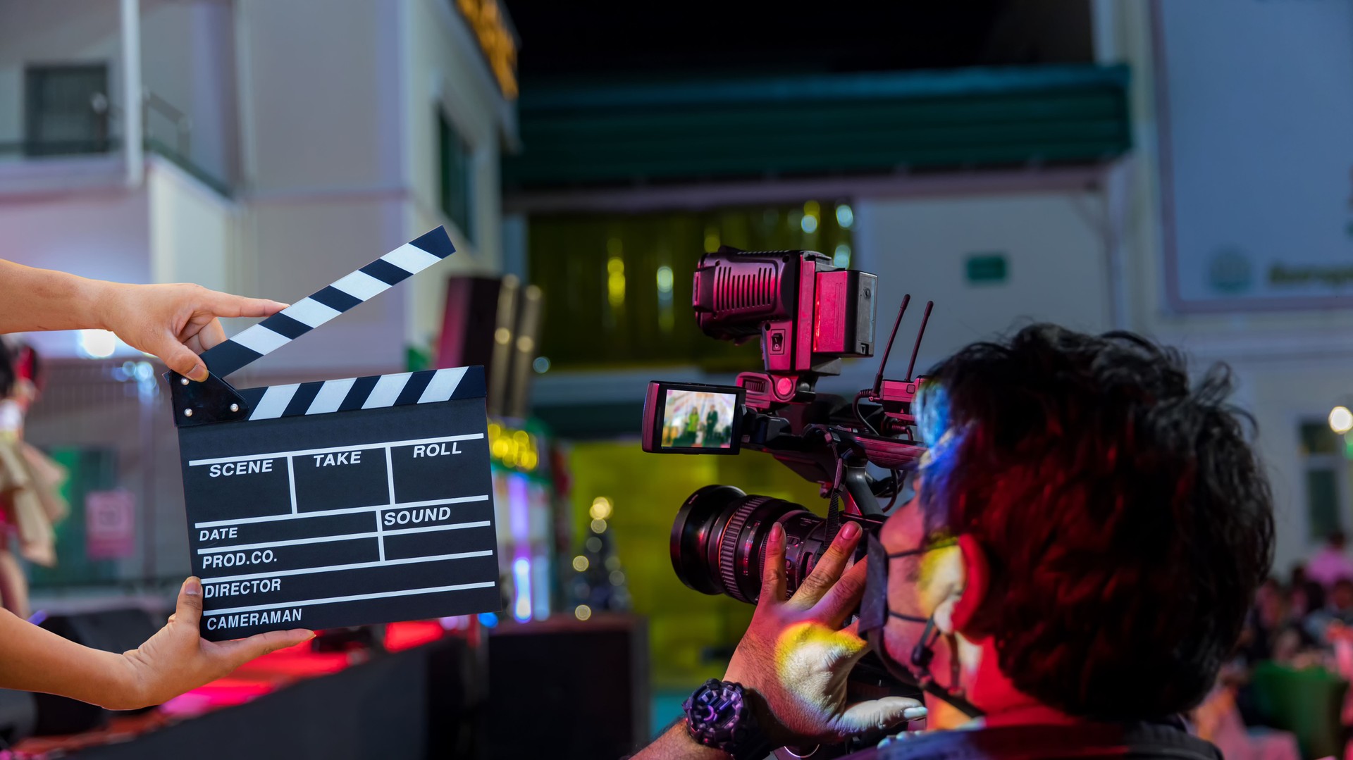 Man hands holding movie clapper.Film director concept.camera show viewfinder image catch motion in interview or broadcast wedding ceremony, catch feeling, stopped motion in best memorial day concept.